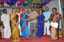 xth standard first rank student Year 2009 C.A.RAVIalais SUBRAMANIAN 396/500getting prize from the chief guest Smt R.Chellammal